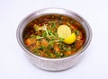chicken mughlai handi served in dish isolated on grey background top view of pakistani food