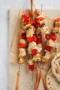 Chicken and mushroom skewers with fresh vegetables. Shish kebab Royalty Free Stock Photo