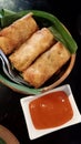Chicken and mushroom spring rolls wrapped in crispy flour skin