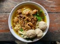 Chicken noodles are an Indonesian dish made from seasoned wheat noodles with chicken meat, usually diced. Royalty Free Stock Photo