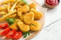 Chicken nuggets and french fries Royalty Free Stock Photo