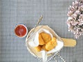 fried nuggets in in a frying pan on the table