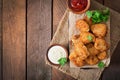 Chicken nuggets and sauce, top view. Royalty Free Stock Photo