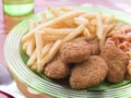 Chicken Nuggets with Spaghetti Hoops and Chips Royalty Free Stock Photo