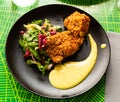 Chicken in panko roasted in tandoor with mousseline sauce Royalty Free Stock Photo