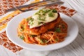 Chicken Parmigiana and pasta with tomatoes close-up Royalty Free Stock Photo