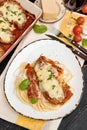 Chicken parmigiana served on top of spaghetti with marinara sauce. Royalty Free Stock Photo