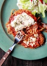 Chicken parmigiana with spaghetti and salad Royalty Free Stock Photo