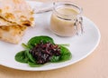 chicken pate with onion jam and pita bread served in a white plate Royalty Free Stock Photo