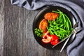 Chicken patties served with steamed green beans