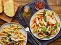 Chicken penne pasta with red bell peppers and asparagus