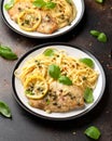 Chicken Piccata with capers, white wine sauce and spaghetti. Italian food Royalty Free Stock Photo