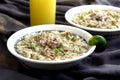 Chicken porridge also known in the Philippines as chicken lugaw or arroz caldo