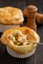 Chicken pot pie with carrot, grean peas and cheese.