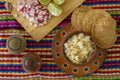 Chicken pozole with radishes, lemons and toast