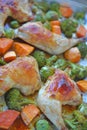 Chicken quarters roasted with healthy vegetables