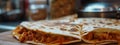 chicken quesadilla close-up on kitchen table Royalty Free Stock Photo