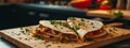 chicken quesadilla close-up on kitchen table Royalty Free Stock Photo