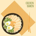 Chicken ramen soup with chopsticks on bamboo placemat poster. Asian food with noodles, chicken, menma, eggs, green onion