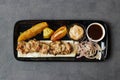 Chicken Reshmi tikka boti Kabab with chili sauce, dip and onion served in dish isolated on table top view of asian and indian food Royalty Free Stock Photo