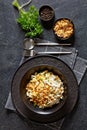 Chicken Rice Casserole in black bowl, top view Royalty Free Stock Photo