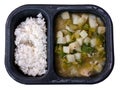 Chicken and rice microwave meal in a black tray isolated Royalty Free Stock Photo