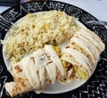 Chicken roll with rice in a very nice dish