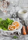 Chicken roulade with pumpkin and fresh green leaf lettuce on a white plate Royalty Free Stock Photo