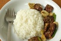 Chicken's liver stir fried onions and sesame with steamed rice