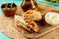 Chicken Saj Shawarma with mayo dip served in a dish isolated on cutting board side view Royalty Free Stock Photo