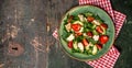 Chicken salad with arugula avocado and strawberries. Plate with a keto diet food. Top view Royalty Free Stock Photo