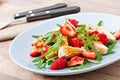 Chicken salad with arugula and strawberries