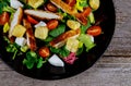 Chicken salad with cherry tomatoes and lettuce food healthy meal close up Royalty Free Stock Photo