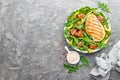 Chicken salad. Meat salad with fresh tomato, sweet pepper, arugula and grilled chicken breast. Chicken fillet with fresh vegetable Royalty Free Stock Photo