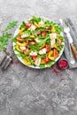 Chicken salad. Meat salad with fresh tomato, sweet pepper, arugula and grilled chicken breast. Chicken fillet with fresh vegetable Royalty Free Stock Photo