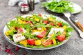 Chicken salad. Meat salad with fresh tomato, sweet pepper, arugula and grilled chicken breast. Chicken fillet with fresh vegetable Royalty Free Stock Photo