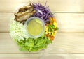 Chicken Salad in Plastic Box on wooden floor Royalty Free Stock Photo