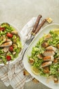 Chicken salads with grilled ingredients