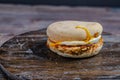 Chicken saussage mcmuffin with egg, and golden brown and crispy, hashbrowns