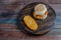 Chicken saussage mcmuffin with egg, and golden brown and crispy, hashbrowns