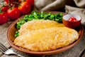 Chicken schnitzel with cheese crust for dinner Royalty Free Stock Photo