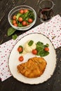 Chicken schnitzel served with mashed potatoes