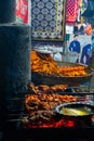 Chicken seekh kababs are being prepared road side