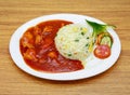 chicken shashlik or chicken manchurian with salad fried rice served in a dish isolated on grey background side view of indian, Royalty Free Stock Photo