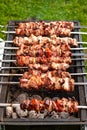 Chicken shashlik in preparation at barbecue