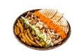 Chicken Shawarma Doner kebab on a plate with french fries, vegetables and salad. Isolated on white background. Royalty Free Stock Photo