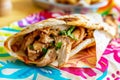 chicken shawarma readytoeat on a colorful paper wrap