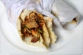 Chicken shawarma sandwich wraps on a plate