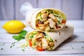 chicken shawarma wrap cut in half, showing the filling Royalty Free Stock Photo