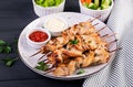 Chicken shish kebab. Shashlik - grilled meat and fresh vegetablesChicken shish kebab. Shashlik - grilled meat Royalty Free Stock Photo